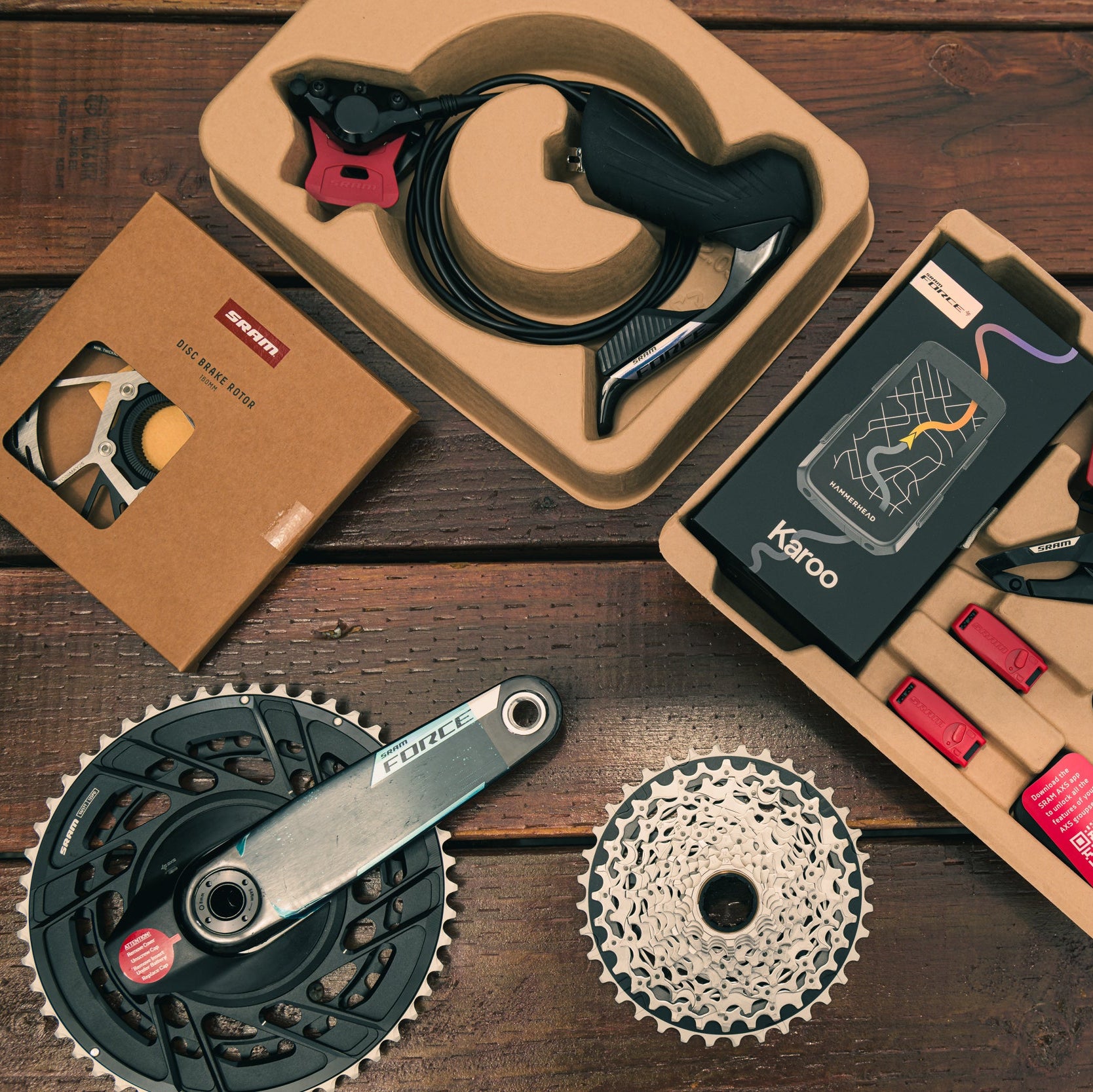 Bicycle gear components on a wooden surface in encinitas